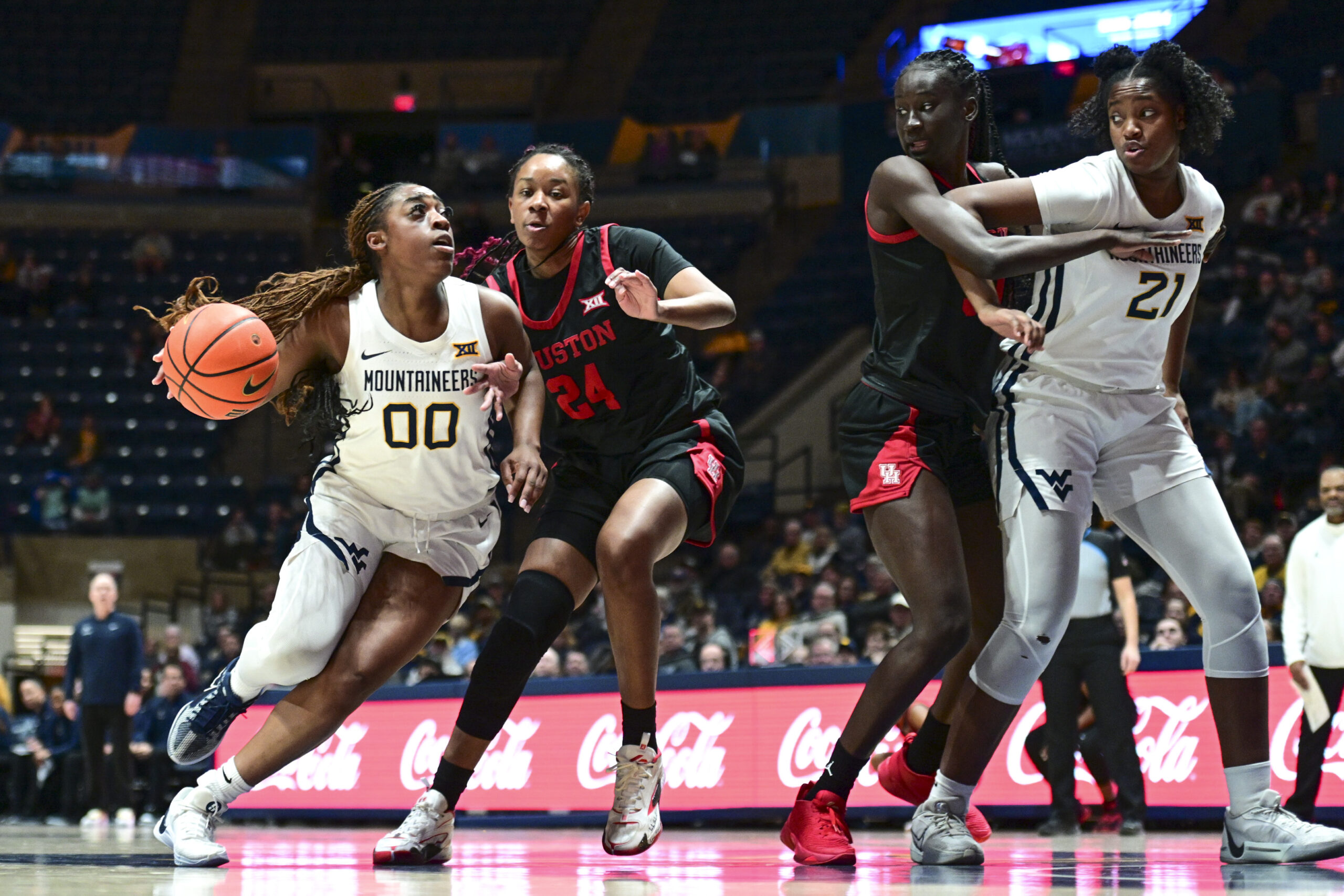 Hemingway reaches 100th career game for WVU despite late start, coaching changes